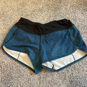 Lululemon blue and black 2.5 low rise speed up shorts. Size 4 regular.